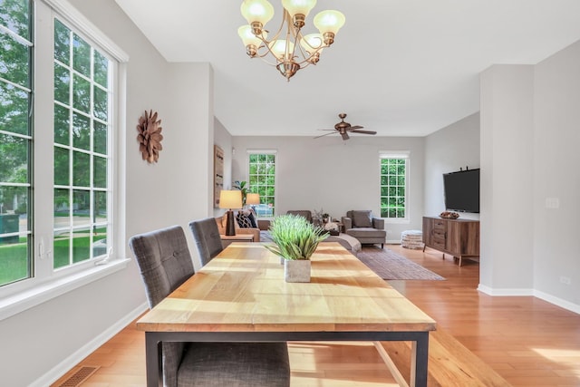 6406 Cunningham Ct, Gurnee, IL 60031 - dining room with light wood-type flooring and a chandelier