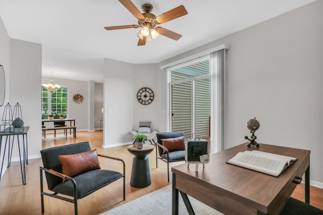6406 Cunningham Ct, Gurnee, IL 60031 - office area featuring a chandelier, light wood-style flooring, and a ceiling fan