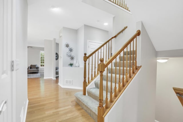 6406 Cunningham Ct, Gurnee, IL 60031 - stairway featuring wood finished floors and recessed lighting