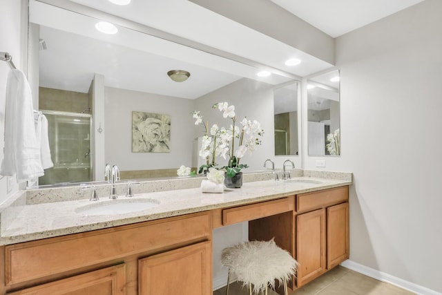 6406 Cunningham Ct, Gurnee, IL 60031 - bathroom featuring double vanity, a shower stall, and tile patterned flooring
