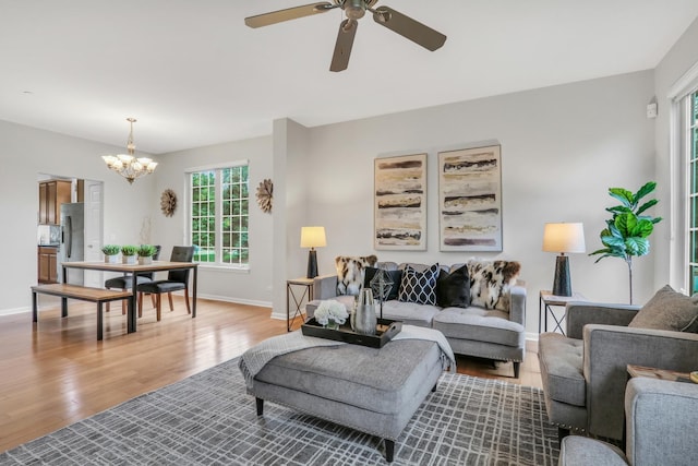 6406 Cunningham Ct, Gurnee, IL 60031 - living room featuring a chandelier, light wood finished floors, and ceiling fan