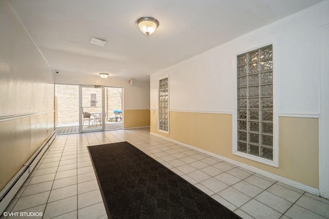 1508 W Pratt Blvd Unit 2C, Chicago, IL 60626 - spare room featuring tile patterned floors and baseboard heating