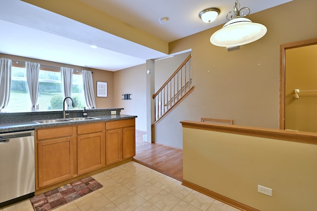 2224 Flagstone Ln Unit 2224, Carpentersville, IL 60110 - kitchen with dishwasher, dark countertops, brown cabinets, and decorative light fixtures