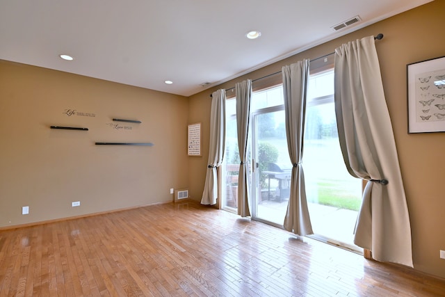 2224 Flagstone Ln Unit 2224, Carpentersville, IL 60110 - unfurnished room with light wood-style floors and recessed lighting