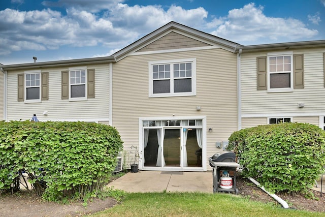 2224 Flagstone Ln Unit 2224, Carpentersville, IL 60110 - back of house with a patio area