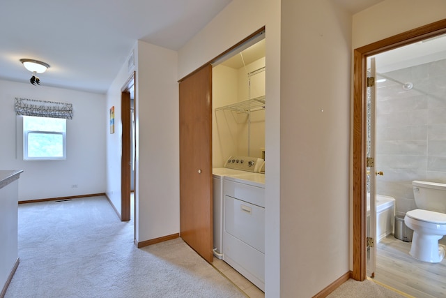 2224 Flagstone Ln Unit 2224, Carpentersville, IL 60110 - hall featuring independent washer and dryer and light colored carpet