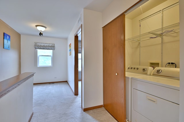 2224 Flagstone Ln Unit 2224, Carpentersville, IL 60110 - laundry room featuring washing machine and dryer and light colored carpet