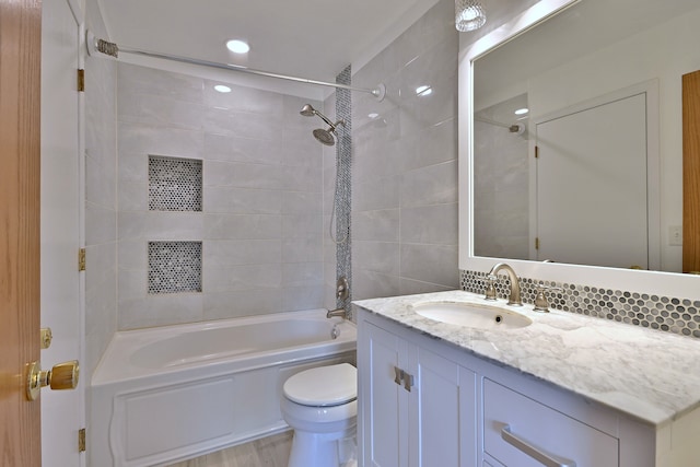2224 Flagstone Ln Unit 2224, Carpentersville, IL 60110 - full bath with vanity, washtub / shower combination, tasteful backsplash, wood finished floors, and recessed lighting