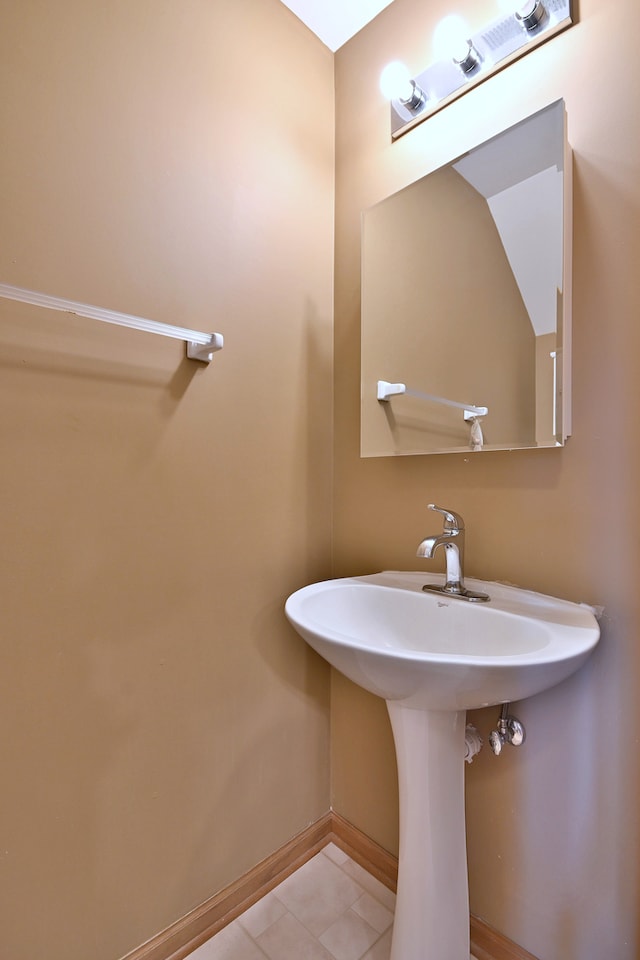 2224 Flagstone Ln Unit 2224, Carpentersville, IL 60110 - bathroom featuring baseboards and tile patterned floors