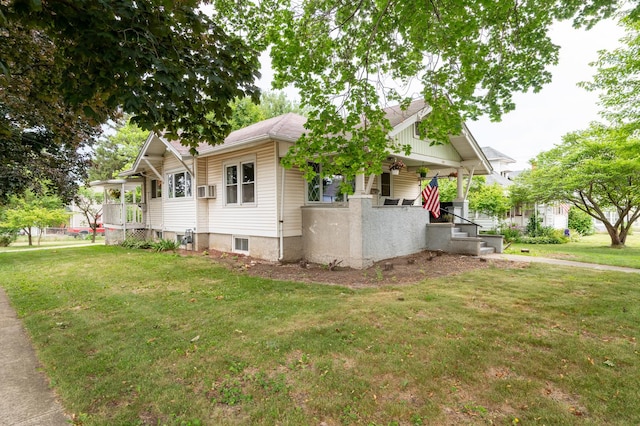 102 E Front St, Mount Morris, IL 61054 - view of side of property featuring a porch and a lawn