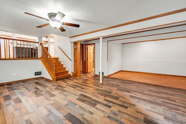 2946 W 102nd St, Evergreen Park, IL 60805 - below grade area with wood finished floors, ceiling fan, and stairway