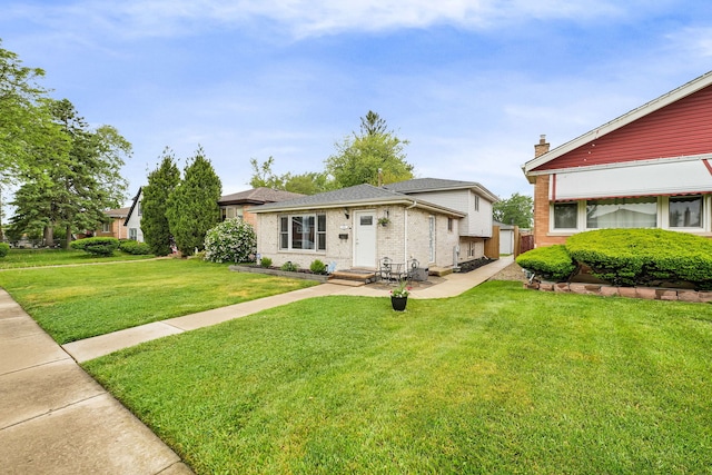 2946 W 102nd St, Evergreen Park, IL 60805 - view of front facade with brick siding, a front yard, and entry steps