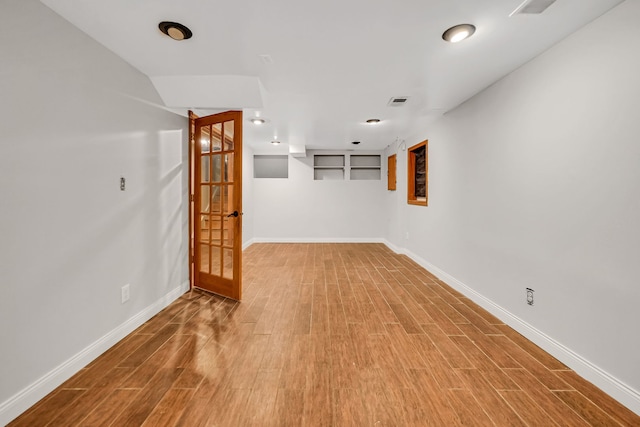 2946 W 102nd St, Evergreen Park, IL 60805 - empty room featuring wood finished floors and french doors