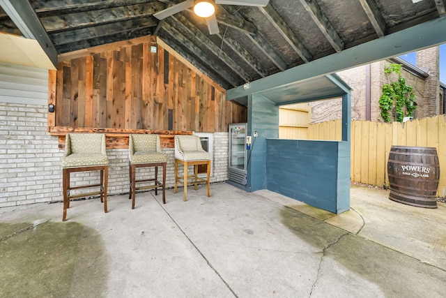 2946 W 102nd St, Evergreen Park, IL 60805 - exterior space with lofted ceiling, unfinished concrete floors, and a ceiling fan