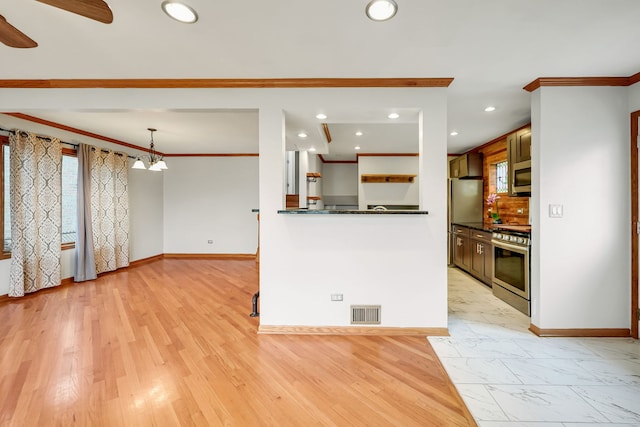 2946 W 102nd St, Evergreen Park, IL 60805 - kitchen with appliances with stainless steel finishes, ornamental molding, dark countertops, recessed lighting, and ceiling fan
