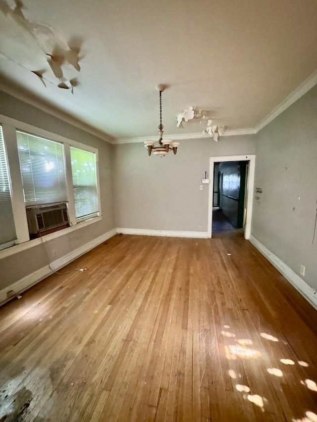 2925 W Eastwood Ave, Chicago, IL 60525 - unfurnished dining area featuring crown molding, a chandelier, hardwood / wood-style flooring, and cooling unit