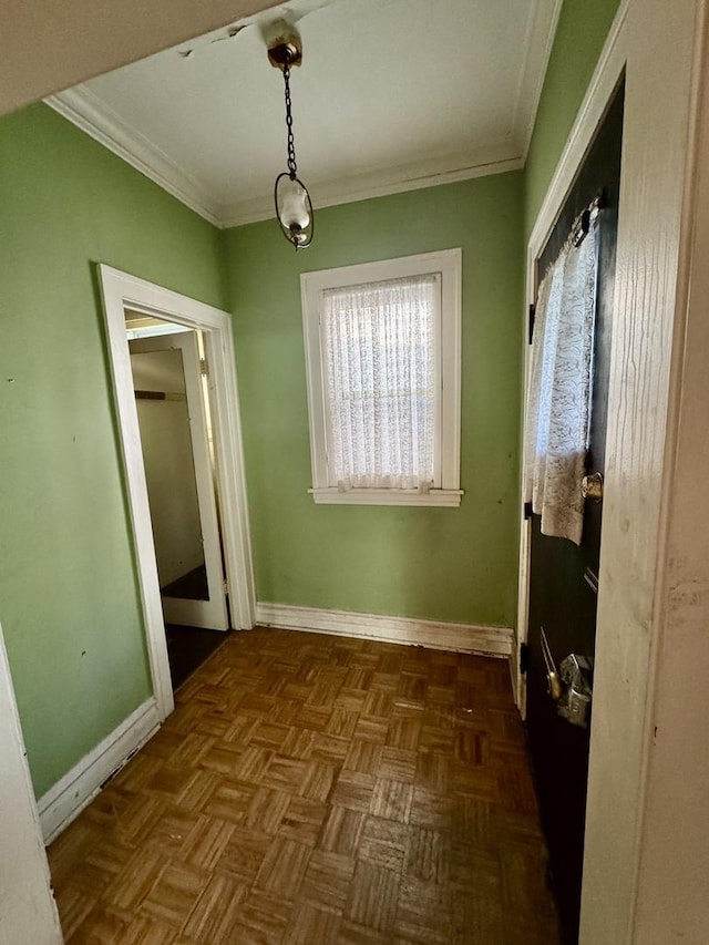 2925 W Eastwood Ave, Chicago, IL 60525 - unfurnished dining area featuring ornamental molding and baseboards
