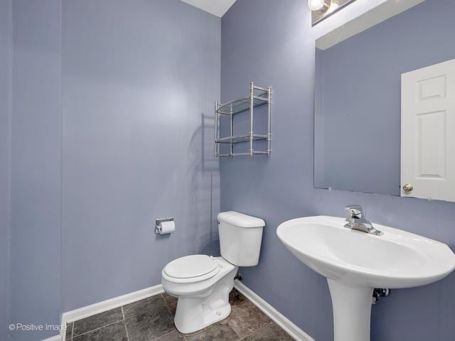 835 Genesee Dr, Naperville, IL 60563 - bathroom featuring toilet and baseboards