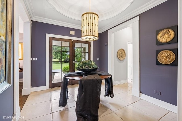 dining room featuring crown molding, light tile patterned flooring, and french doors