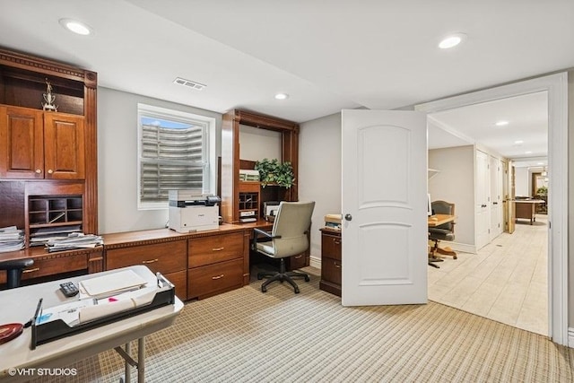 office space featuring recessed lighting
