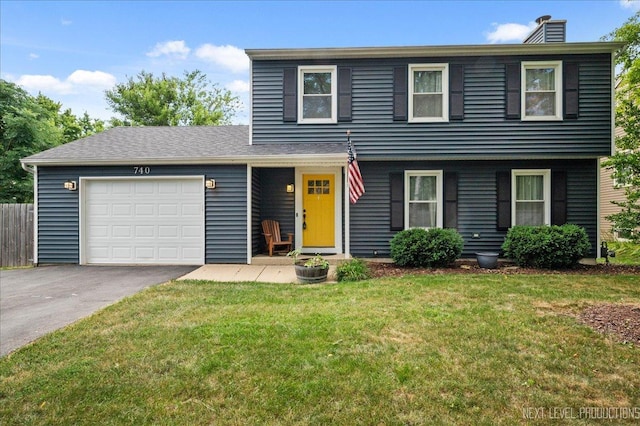 740 Lexington Ave, Saint Charles, IL 60174 - view of front of home with a chimney, a garage, and driveway