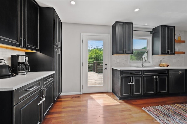 740 Lexington Ave, Saint Charles, IL 60174 - kitchen with dark cabinetry, stainless steel dishwasher, light countertops, and recessed lighting