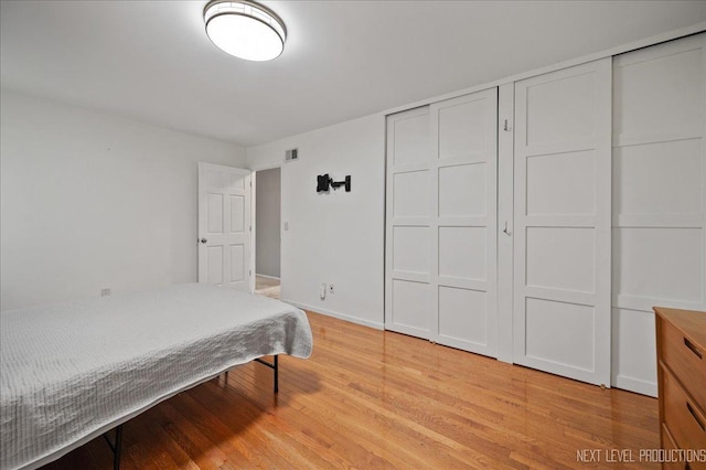740 Lexington Ave, Saint Charles, IL 60174 - bedroom with light wood-style floors and a closet