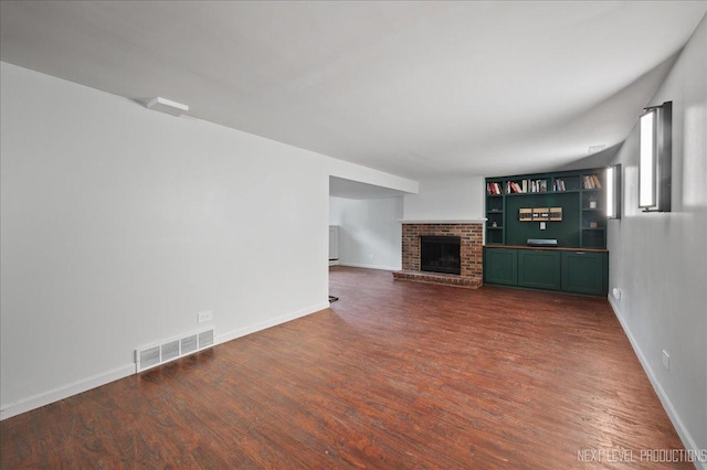 740 Lexington Ave, Saint Charles, IL 60174 - unfurnished living room with wood finished floors and a fireplace
