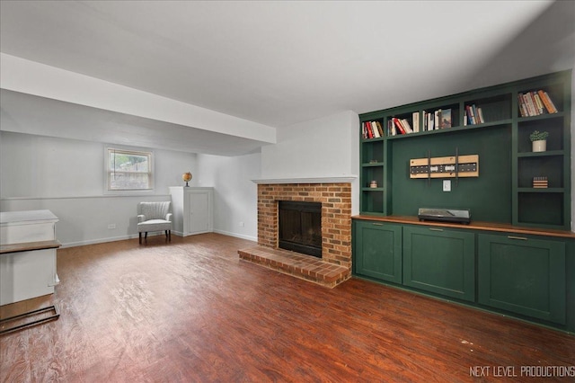 740 Lexington Ave, Saint Charles, IL 60174 - living area with dark wood-style flooring, built in features, and a brick fireplace