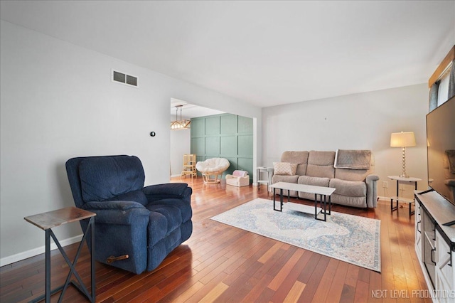 740 Lexington Ave, Saint Charles, IL 60174 - living area featuring hardwood / wood-style flooring and a chandelier