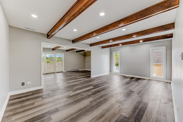 5721 Circle Dr Unit 202, Oak Lawn, IL 60453 - unfurnished living room with recessed lighting, plenty of natural light, wood finished floors, a baseboard radiator, and beamed ceiling