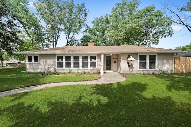 230 Mantua St, Park Forest, IL 60466 - ranch-style home featuring a front lawn and a chimney