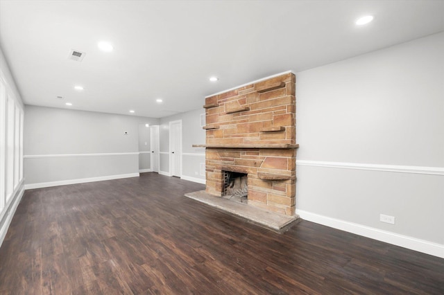 230 Mantua St, Park Forest, IL 60466 - unfurnished living room with a stone fireplace, recessed lighting, and wood finished floors