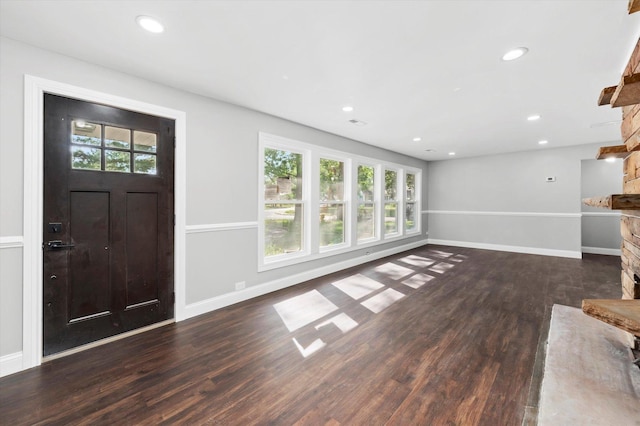 230 Mantua St, Park Forest, IL 60466 - foyer featuring a fireplace with raised hearth, wood finished floors, and recessed lighting
