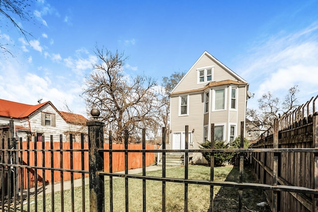 7523 S Kimbark Ave, Chicago, IL 60619 - view of front of home with a fenced backyard