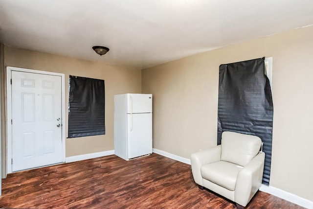 7523 S Kimbark Ave, Chicago, IL 60619 - living area with dark wood finished floors and baseboards
