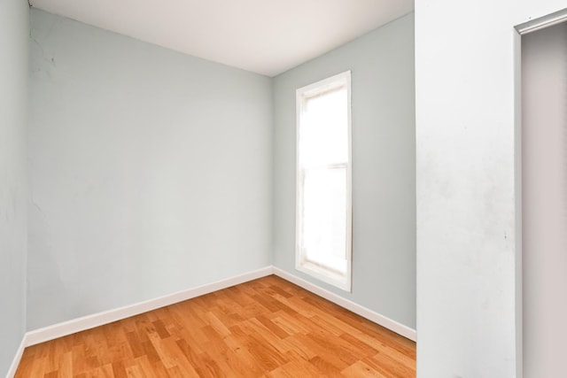 7523 S Kimbark Ave, Chicago, IL 60619 - empty room featuring light wood-style floors