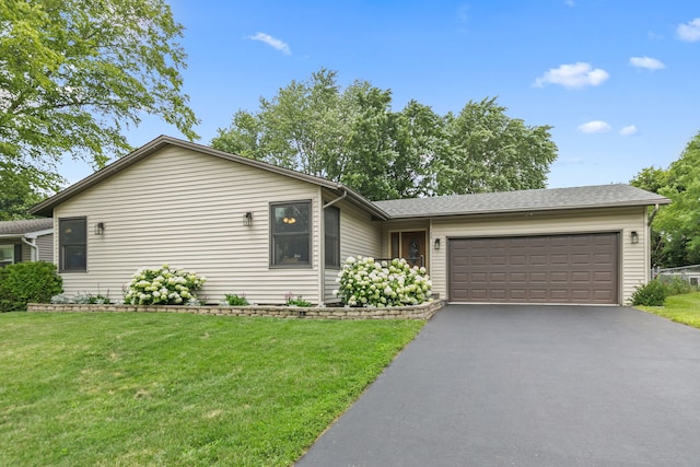 588 Arthur Dr, Cary, IL 60013 - single story home with a garage, asphalt driveway, and a front lawn