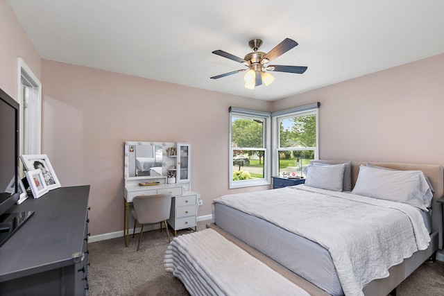 588 Arthur Dr, Cary, IL 60013 - carpeted bedroom with baseboards and ceiling fan