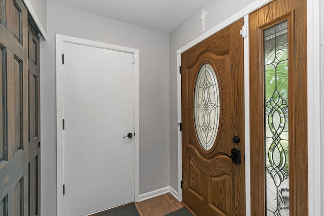 588 Arthur Dr, Cary, IL 60013 - entrance foyer featuring healthy amount of natural light and dark wood-type flooring