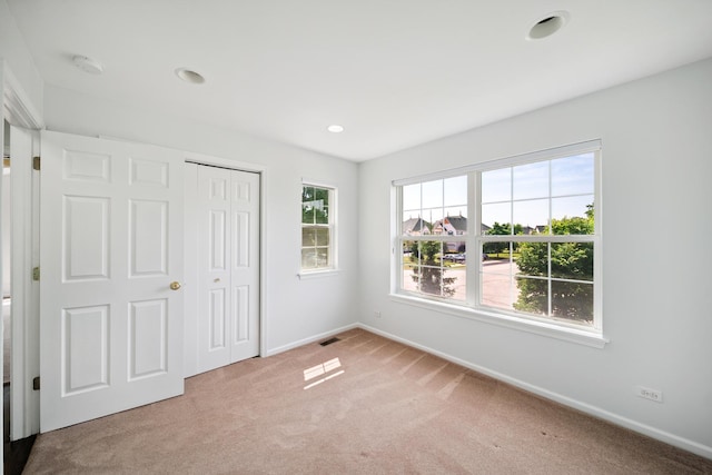 415 Bay Tree Cir, Vernon Hills, IL 60061 - unfurnished bedroom with carpet floors, a closet, and recessed lighting