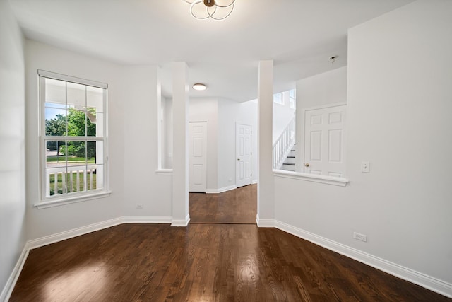 415 Bay Tree Cir, Vernon Hills, IL 60061 - spare room with dark wood-style floors and stairway