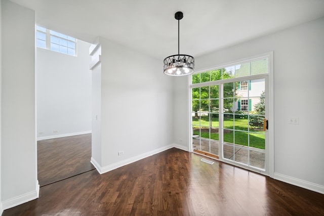 415 Bay Tree Cir, Vernon Hills, IL 60061 - unfurnished dining area featuring a chandelier and wood finished floors