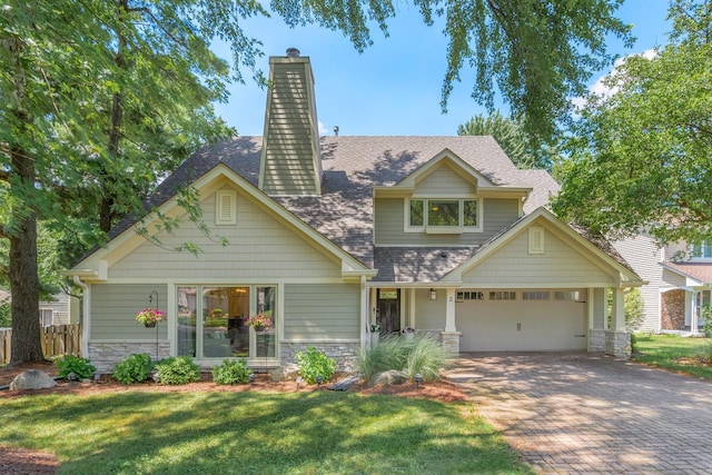 2 Cedar Gate Cir, Sugar Grove, IL 60554 - craftsman inspired home featuring decorative driveway, stone siding, and a garage