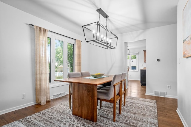 2 Cedar Gate Cir, Sugar Grove, IL 60554 - dining room with wood finished floors and a chandelier