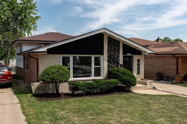 15709 Maryland Ave, Dolton, IL 60419 - view of front facade featuring brick siding, a front lawn, and a shingled roof