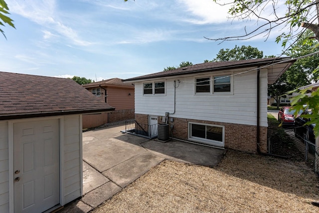 15709 Maryland Ave, Dolton, IL 60419 - rear view of house featuring a patio and brick siding