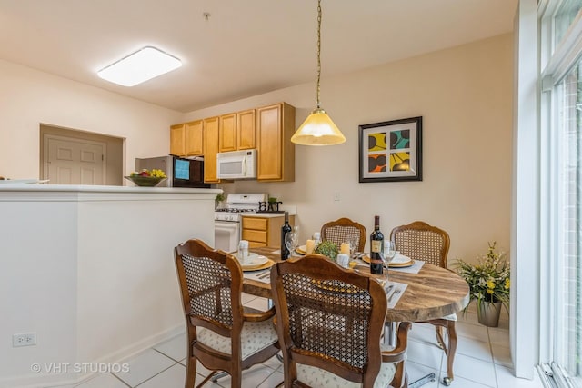 976 Enfield Dr, Northbrook, IL 60062 - dining room featuring light tile patterned floors