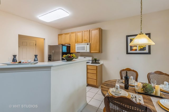 976 Enfield Dr, Northbrook, IL 60062 - kitchen with white microwave, stainless steel fridge with ice dispenser, pendant lighting, light tile patterned floors, and light countertops