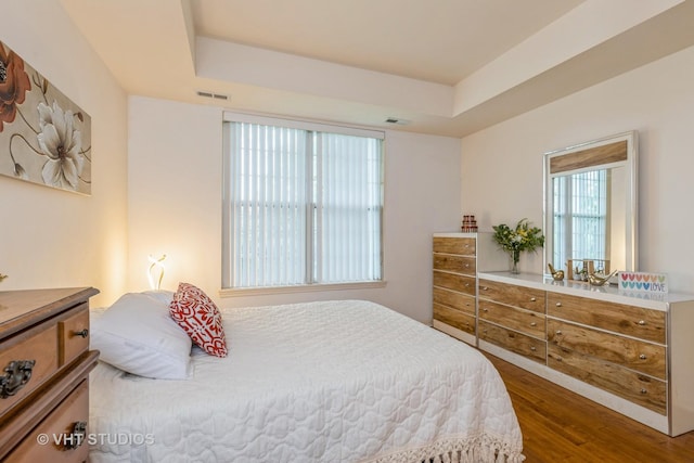 976 Enfield Dr, Northbrook, IL 60062 - bedroom with wood finished floors and a tray ceiling